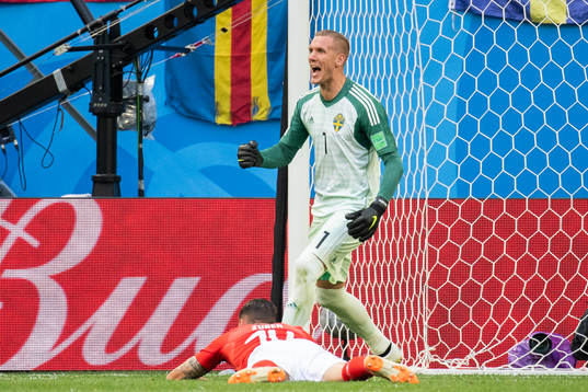 goalkeeper Robin Olsen of Sweden reacts