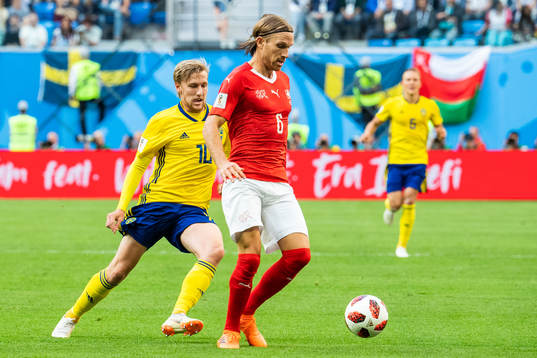 Michael Lang of Switzerland and Emil Forsberg of Sweden