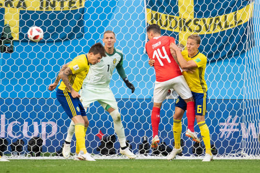 Steven Zuber of Switzerland with a chance to score against