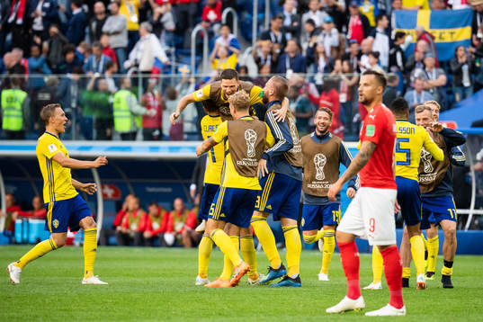 Players of Sweden celebrate