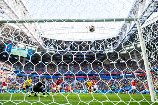 Emil Forsberg of Sweden scores 1-0 behind goalkeeper Yann