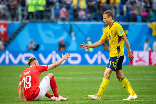 Viktor Claesson of Sweden thanks Josip Drmic of Switzerland