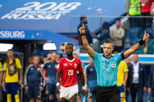 The referee signals for video review