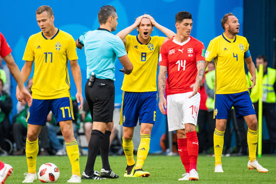 Albin Ekdal of Sweden reacts towards the referee