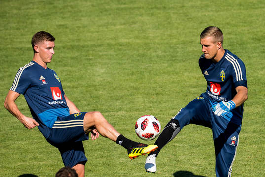 Emil Krafth and goalkeeper Karl-Johan Johnsson of the