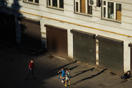 Kids play football