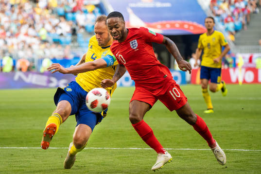 Andreas Granqvist of Sweden competes for the ball with