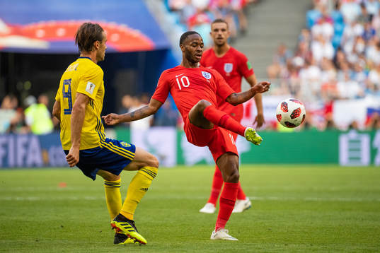 Albin Ekdal of Sweden and Raheem Sterling of England