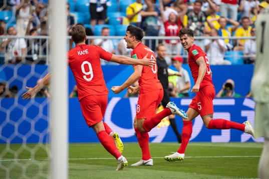 Harry Kane, Harry Maguire and John Stones celebrates