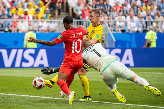 Emil Krafth and goalkeeper Robin Olsen of Sweden saves a