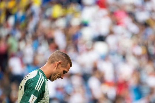 Goalkeeper Robin Olsen of Sweden looks dejected