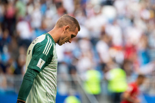 Goalkeeper Robin Olsen of Sweden looks dejected