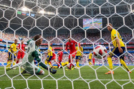 Goalkeeper Robin Olsen and Ola Toivonen watches as Harry