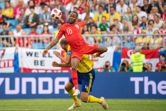 Andreas Granqvist of Sweden and Raheem Sterling of England