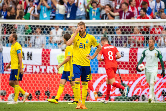 Ola Toivonen of Sweden looks dejected
