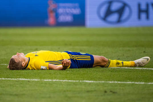 Viktor Claesson of Sweden looks dejected