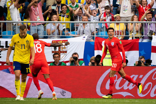 Dele Alli of England celebrates scoring 0-2