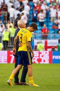 Team Manager Lars Richt hugs Victor Nilsson Lindelöf of