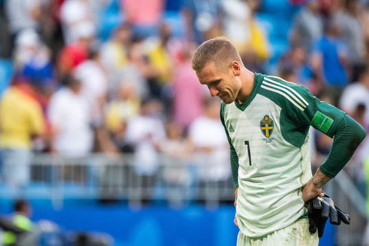 Goalkeeper Robin Olsen of Sweden looks dejected