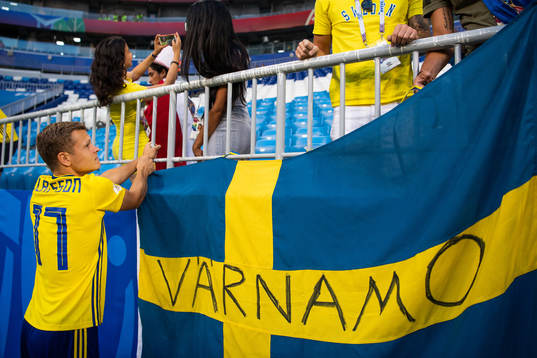 Viktor Claesson removes a flag and looks dejected