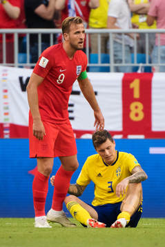 Harry Kane of England and Victor Nilsson Lindelöf of Sweden