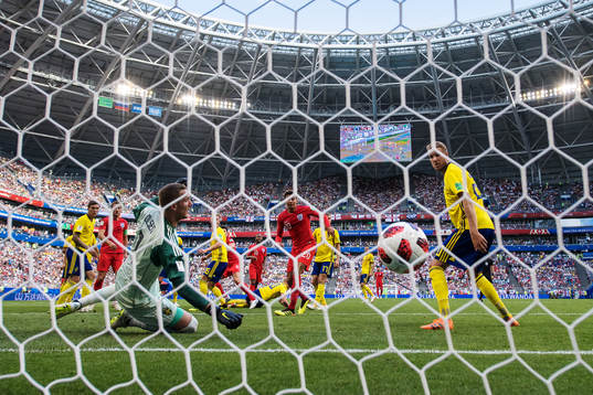 Harry Maguire of England scores 0-1 behind goalkeeper Robin