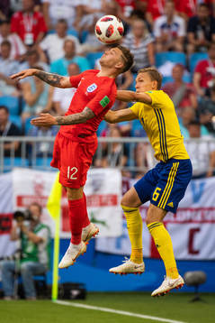 Kieran Trippier of England and Ludwig Augustinsson of