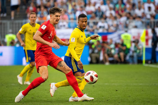 John Stones of England and of Sweden Martin Olsson