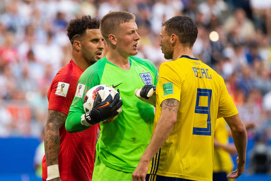 Marcus Berg of Sweden in a disussion with goalkeeper Jordan