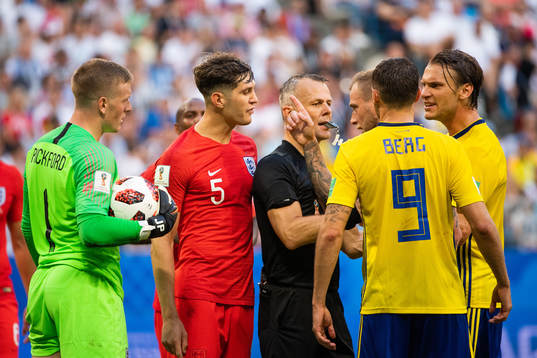 Marcus Berg and Albin Ekdal of Sweden in a discussion with