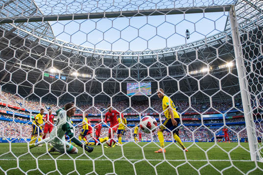 Harry Maguire of England scores 0-1 behind goalkeeper Robin