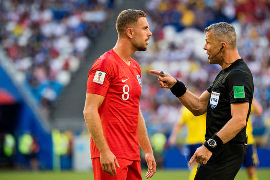 Albin Ekdal of Sweden and the referee
