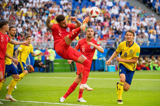 Kyle Walker of England and Albin Ekdal of Sweden