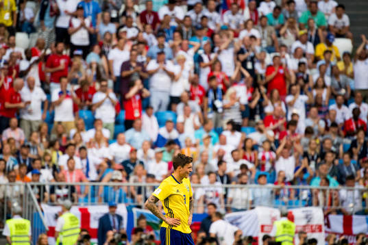 Victor Nilsson Lindelöf of Sweden looks dejected