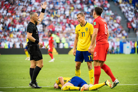 Emil Krafth of Sweden with an injury
