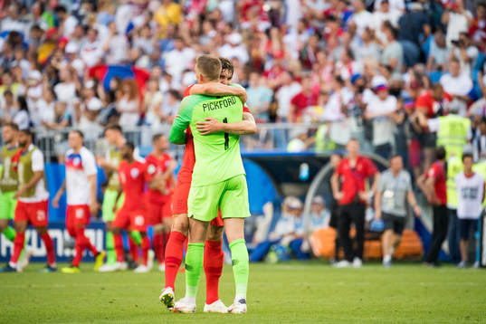 John Stones and goalkeeper Jordan Pickford of England