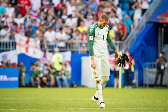 Goalkeeper Robin Olsen of Sweden looks dejected