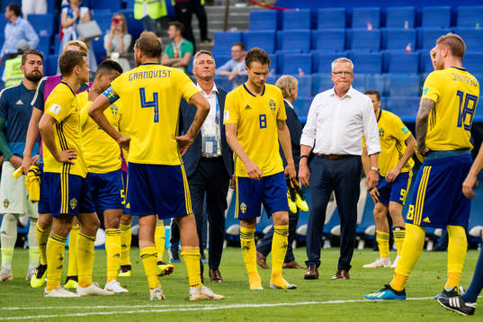 Albin Ekdal and head coach Janne Andersson of Sweden look