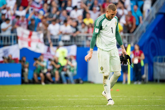 Goalkeeper Robin Olsen of Sweden looks dejected