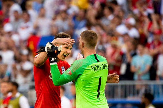 John Stones and goalkeeper Jordan Pickford celebrates