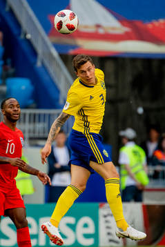 Raheem Sterling of England and Victor Nilsson Lindelöf of