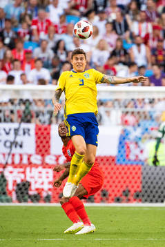 Victor Nilsson Lindelöf of Sweden competes for the ball