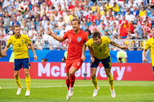 Harry Kane of England and Victor Nilsson Lindelöf of