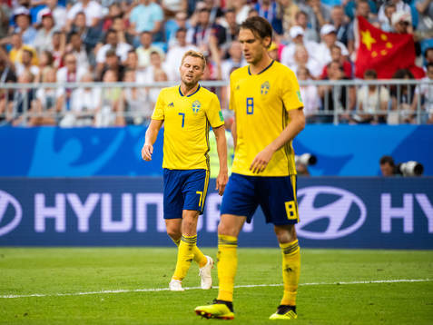 Sebastian Larsson and Albin Ekdal of Sweden looks dejected