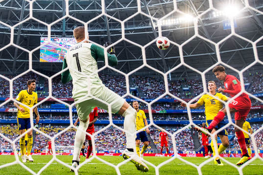 Dele Alli of England scores 0-2 behind goalkeeper Robin