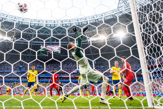 Dele Alli of England scores 0-2 behind goalkeeper Robin