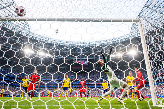 Dele Alli of England scores 0-2 behind goalkeeper Robin