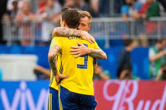 John Guidetti and Victor Nilsson Lindelöf hugs as they