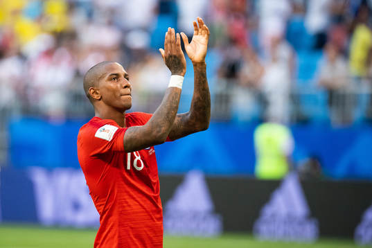 Ashley Young of England celebrates