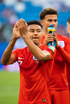 Jesse Lingard of England celebrates